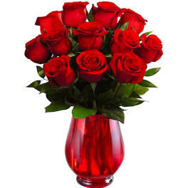Red roses arranged in a red glass vase