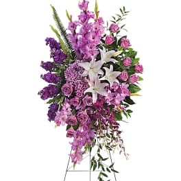 Tall standing floral spray with pink, purple, and white flowers