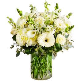 White flowers arranged in a clear glass vase