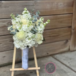 White and pale yellow bouquet with roses and stock flowers