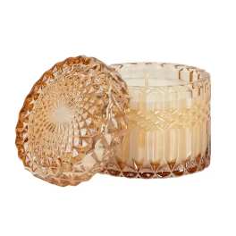 Amber glass candle jar with a faceted lid
