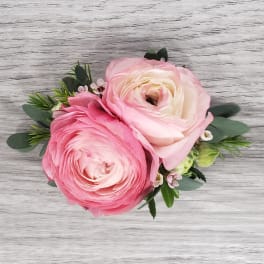 Pink and blush ranunculus bouquet with greenery