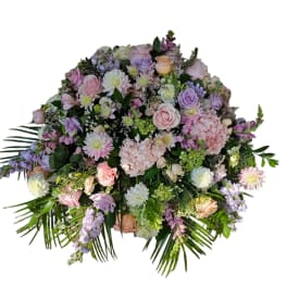 Large pastel bouquet with roses, hydrangeas, and mixed blooms