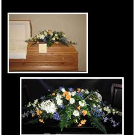 Casket spray with white, orange, and blue flowers