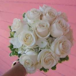 Bouquet of white roses with green accents