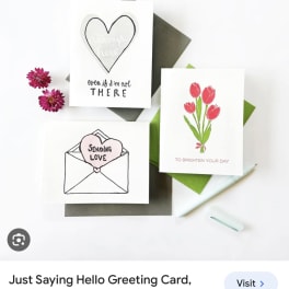 Three greeting cards with heart and tulip designs on envelopes