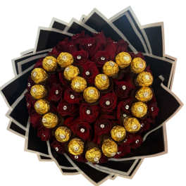 Bouquet of red roses with gold-wrapped chocolates and black paper