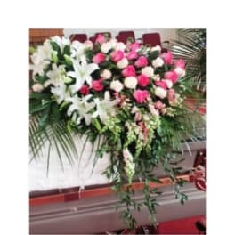 Large standing floral spray with white lilies and pink roses