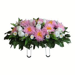 Pink and white floral casket spray with greenery
