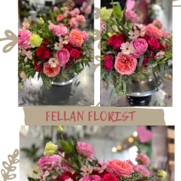 Pink and red rose bouquet in a gold vase