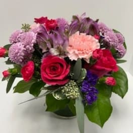 Bouquet of pink and purple flowers in a vase
