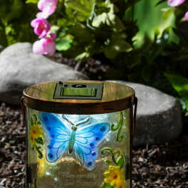Butterfly memorial lantern with floral accents and a quote