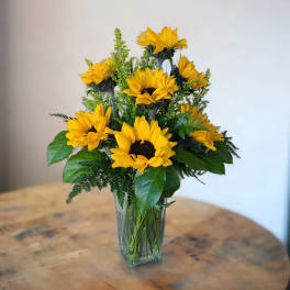 Sunflower bouquet in a clear glass vase
