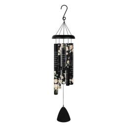 Black hanging wind chime with floral-print tubes and a bell