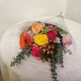 Mixed bouquet with roses, gerbera daisy, carnations, and pink alstroemeria