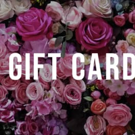 Pink and white roses with hydrangea behind the words "GIFT CARD"