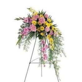 Pink and yellow floral spray on a standing easel