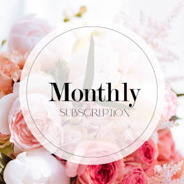 Pink and white flowers behind a circular Monthly Subscription label