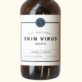Amber dropper bottle labeled skin virus drops