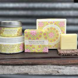 Lemon verbena candle, soap, body butter, and a bar on a shelf