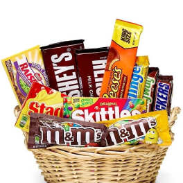 Basket filled with assorted candy bars and chocolate packs