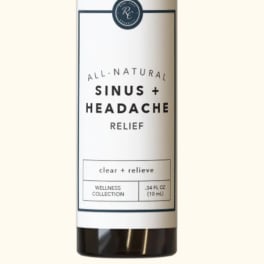 Small amber bottle labeled sinus and headache relief
