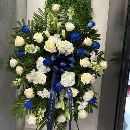 Blue funeral spray