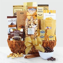 Gift basket filled with assorted chocolates, cookies, and popcorn