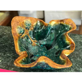 Decorative ceramic bowl with teal and gold glaze