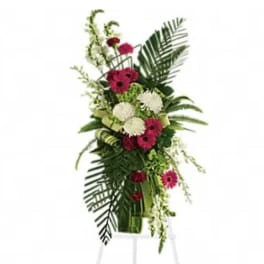Tall floral spray with pink and white blooms on a stand