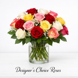 Mixed roses in a clear glass vase