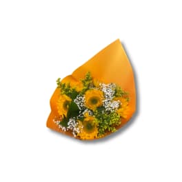 Bouquet of yellow sunflowers wrapped in bright orange paper