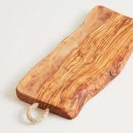 Wooden serving board with a clear handle on a white background