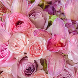 Pink and lavender bouquet with roses and orchids