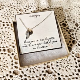 Necklace in a gift box with a memorial message card