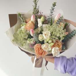 Hand-tied bouquet of peach and white roses with pink tulips