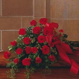 Bouquet of red roses tied with a red ribbon