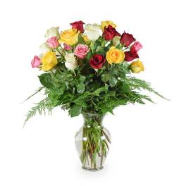 Bouquet of multicolored roses in a clear glass vase