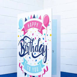 Birthday greeting card with balloons and confetti