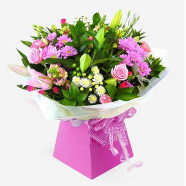 Pink and white mixed bouquet in a pink gift box with ribbon