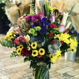 Colorful mixed bouquet in a clear glass vase