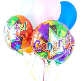Colorful congratulatory balloons with pastel balloons behind them