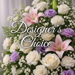 Bouquet of white roses, pink lilies, and purple blooms