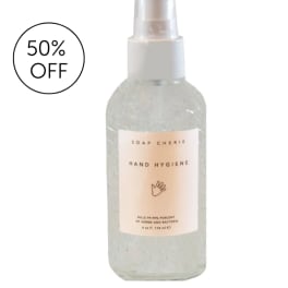 Clear hand sanitizer bottle with a spray top and discount badge