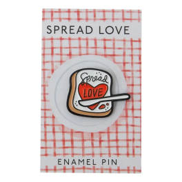Enamel pin on a card with a toast and heart design