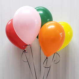 Cluster of colorful balloons against a plain wall