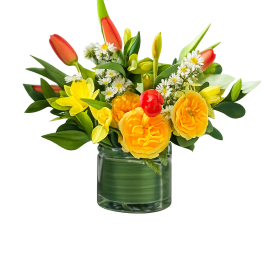 Yellow and orange floral arrangement in a glass vase
