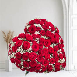 Large bouquet of red roses with white baby's breath