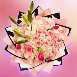 Large bouquet of pink and white roses with lily buds in pink and black wrap
