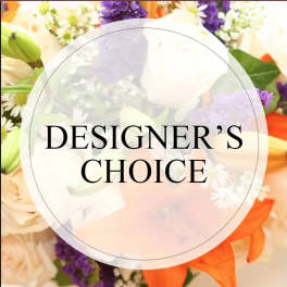 Designer’s choice floral arrangement with mixed blooms in white, purple, and orange